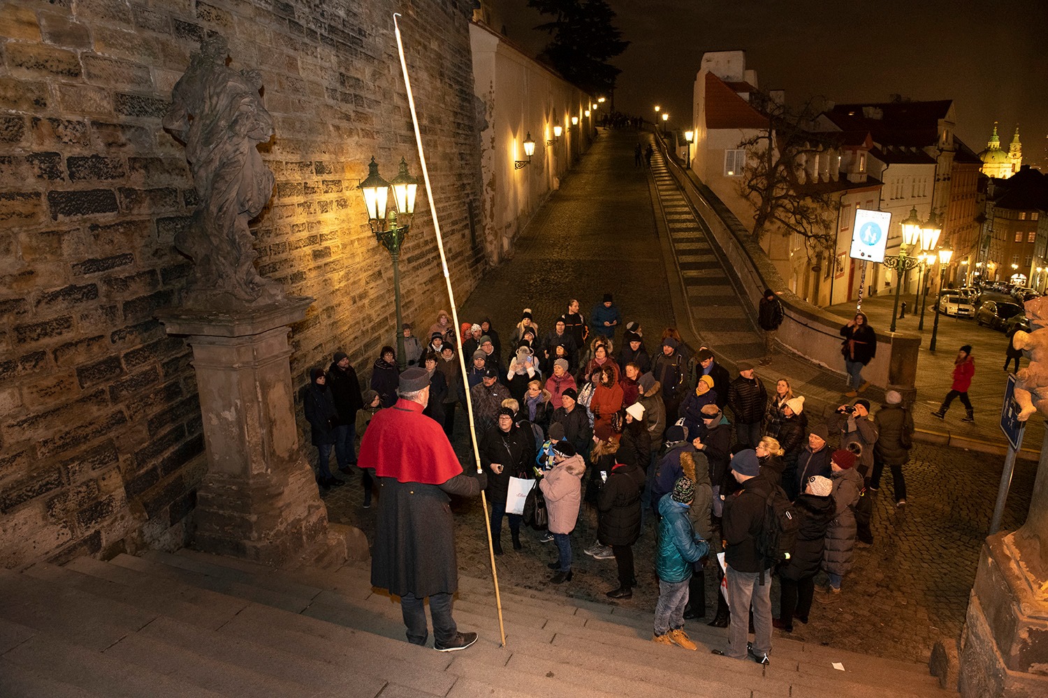 Přednáška lampáře v Nerudově ulici